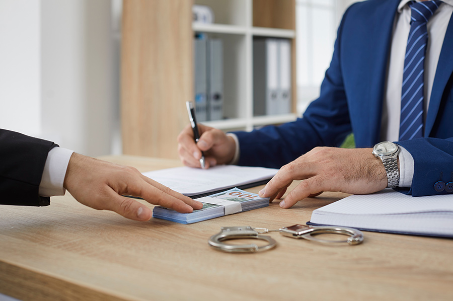 Licensed Louisiana bail bondsman reviewing felony bond paperwork