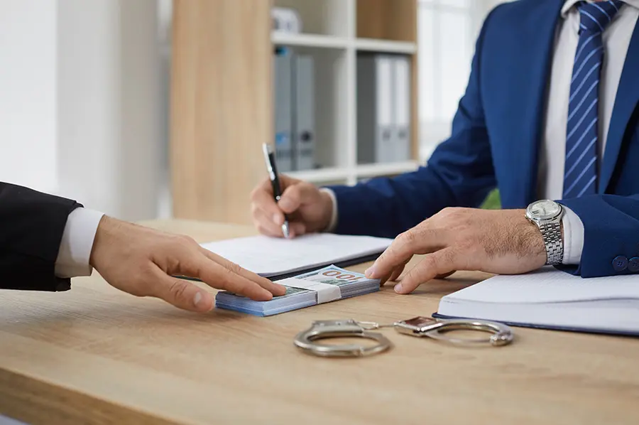 Licensed Louisiana bail bondsman reviewing felony bond paperwork